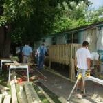 The Lansing, MI tuesday Toolmen Chapter prepare to build a wheelchair ramp for a client.
